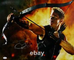 Jeremy Renner Autographed 16x20 Hawkeye Photo Fire Background- JSA W Auth Sil